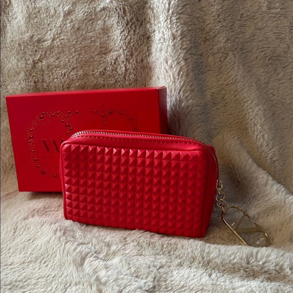 Valentino cosmetic pouch with lipsticks